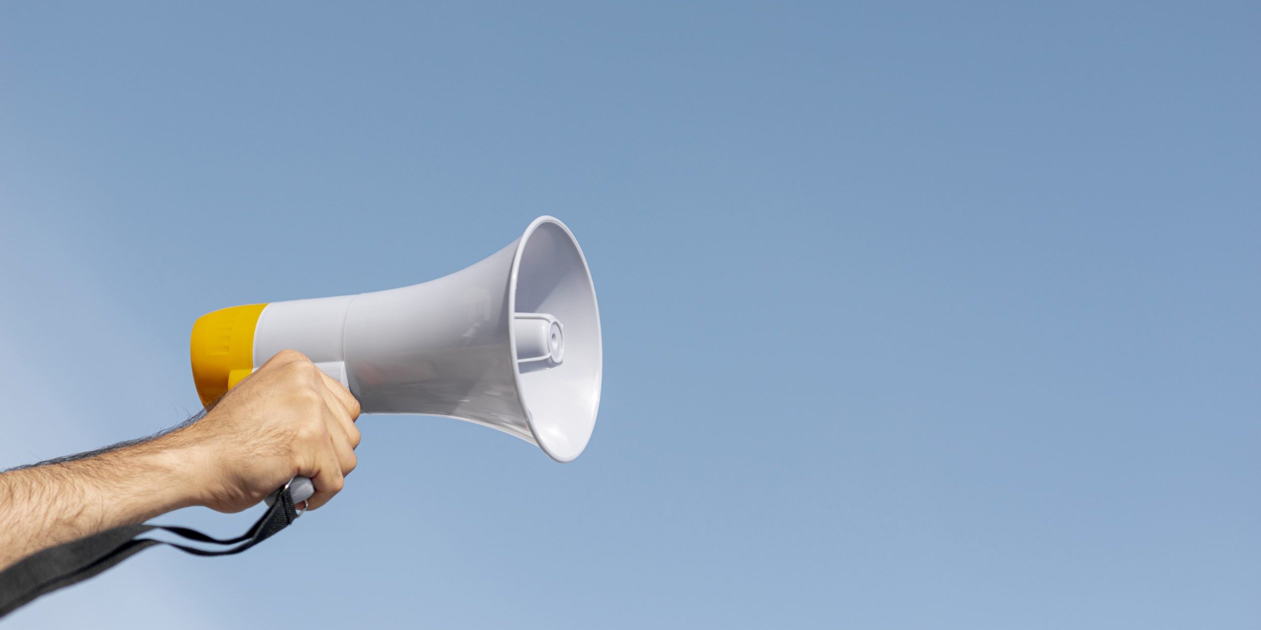 protester-holding-megaphone-demonstration