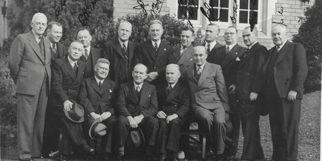 The McKell ministry with signatures on the photograph of certain ministers. Photo not included with the article.