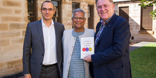 Adam Geha, Muhammad Yunus, and Michael Easson, with the book A World of Three Zeros.