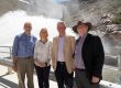 The water gushes at the new Cotter Dam opening on 12 October 2013. In the frame are John Dymke, Chief Engineer, ACTEW, Katy Gallagher, Chief Minister, March Sullivan, CEO of ACTEW, and ACTEW Chair Michael Easson.