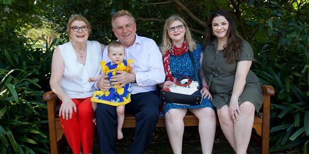 Mary, Isabella Burke, Michael, Louise Burke (née Easson), and Amanda Howard (née Easson), 14 February 2020 in the Botantical Gardens, on the park bench named in honour of Afif Gabriel Geha and Margaret June “Betty” Mariani, formerly Easson.