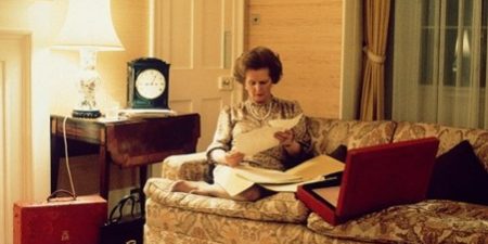 Thatcher reading official papers in Downing Street circa 1983; photo originally published in British Vogue.